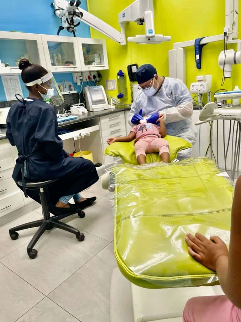 Dental patient undergoing treatment in clinic, child dental care, Pediatric dentistry in South Africa, DrSPateldentist.